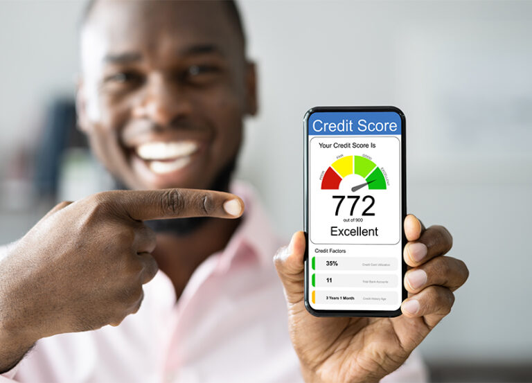 man pointing at high credit score